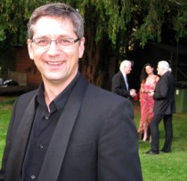 Bruce Martin, flute, photographed at Nuthurst in 2011 with Jon in the background